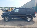 2003 Mitsubishi Montero — photo 14 of 16 | VIN JA4MT21H73J007674