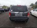 2014 Honda Pilot — photo 16 of 16 | VIN 5FNYF4H97EB032190