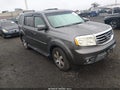 2014 Honda Pilot — photo 1 of 16 | VIN 5FNYF4H97EB032190