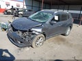 2015 Nissan Rogue — photo 2 of 16 | VIN 5N1AT2MLXFC774349