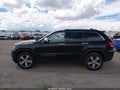 2015 Jeep Grand Cherokee — photo 14 of 16 | VIN 1C4RJFBG4FC878782