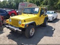 2000 Jeep Wrangler — photo 2 of 11 | VIN 1J4FA49S9YP737813