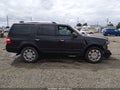 2011 Ford Expedition — photo 14 of 21 | VIN 1FMJU2A53BEF05756