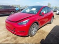 2023 Tesla Model Y — photo 2 of 19 | VIN 7SAYGDEE6PF692547