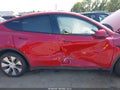 2023 Tesla Model Y — photo 6 of 19 | VIN 7SAYGDEE6PF692547