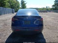 2021 Tesla Model Y — photo 15 of 18 | VIN 5YJYGDEE8MF071190