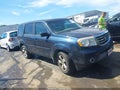 2012 Honda Pilot — photo 13 of 16 | VIN 5FNYF3H59CB027500