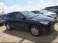 2015 Mazda CX-5 — photo 13 of 16 | VIN JM3KE2BE4F0450927