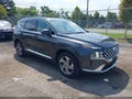 2022 Hyundai Santa Fe — photo 1 of 16 | VIN 5NMS24AJ3NH384865