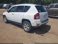 2014 Jeep Compass — photo 3 of 12 | VIN 1C4NJCBA1ED539091