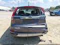 2016 Honda CR-V — photo 17 of 21 | VIN 2HKRM4H58GH711719