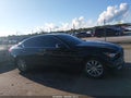 2016 Infiniti Q50 — photo 13 of 16 | VIN JN1CV7AP5GM201580