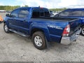 2014 Toyota Tacoma — photo 3 of 16 | VIN 5TFJU4GN0EX054852