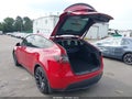 2022 Tesla Model Y — photo 3 of 22 | VIN 7SAYGDEF2NF391117