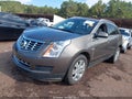 2016 Cadillac SRX — photo 2 of 16 | VIN 3GYFNBE33GS581940