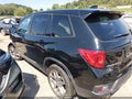2022 Honda Passport — photo 3 of 17 | VIN 5FNYF8H54NB027100