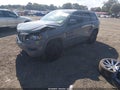 2021 Jeep Grand Cherokee — photo 2 of 16 | VIN 1C4RJFAG5MC833834