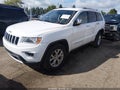 2015 Jeep Grand Cherokee — photo 2 of 16 | VIN 1C4RJFBGXFC871657