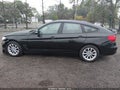 2014 BMW 3 Series — photo 14 of 16 | VIN WBA3X5C54ED242896