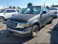 2002 Ford F-150 — photo 2 of 11 | VIN 1FTRF17202NA32861