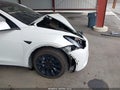 2022 Tesla Model Y — photo 20 of 23 | VIN 7SAYGDEE0NF487643