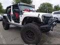 2009 Jeep Wrangler Unlimited — photo 1 of 16 | VIN 1J4GA391X9L711459