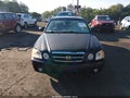 2004 Kia Optima — photo 12 of 16 | VIN KNAGD128645299916
