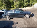 2004 Kia Optima — photo 13 of 16 | VIN KNAGD128645299916