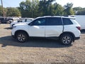 2022 Honda Passport — photo 14 of 16 | VIN 5FNYF8H66NB030010