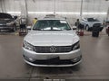 2014 Volkswagen Passat — photo 12 of 16 | VIN 1VWCN7A35EC014429
