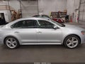 2014 Volkswagen Passat — photo 13 of 16 | VIN 1VWCN7A35EC014429