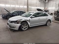 2014 Volkswagen Passat — photo 2 of 16 | VIN 1VWCN7A35EC014429
