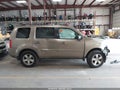 2011 Honda Pilot — photo 13 of 16 | VIN 5FNYF3H59BB048474