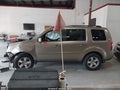 2011 Honda Pilot — photo 14 of 16 | VIN 5FNYF3H59BB048474