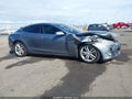 2013 Tesla Model S — photo 12 of 15 | VIN 5YJSA1DP0DFP27147