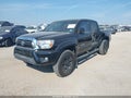 2015 Toyota Tacoma — photo 2 of 16 | VIN 5TFLU4EN3FX138807