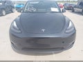 2024 Tesla Model Y — photo 11 of 17 | VIN 7SAYGDED7RF093392