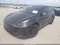 2024 Tesla Model Y — photo 2 of 17 | VIN 7SAYGDED7RF093392