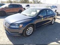 2015 Volkswagen Passat — photo 2 of 16 | VIN 1VWAT7A3XFC039812