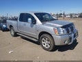 2004 Nissan Titan — photo 1 of 12 | VIN 1N6AA06B34N582322