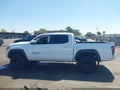 2023 Toyota Tacoma — photo 14 of 16 | VIN 3TYCZ5ANXPT107112