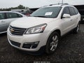 2015 Chevrolet Traverse — photo 2 of 16 | VIN 1GNKVJKD7FJ136278