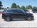 2018 BMW X1 — photo 12 of 15 | VIN WBXHT3C39J5L34147