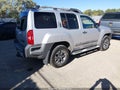 2014 Nissan Xterra — photo 4 of 17 | VIN 5N1AN0NW5EN814640