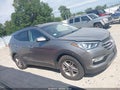 2017 Hyundai Santa Fe — photo 12 of 15 | VIN 5XYZUDLB9HG424248