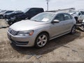 2013 Volkswagen Passat — photo 2 of 13 | VIN 1VWBP7A32DC142356