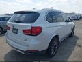 2014 BMW X5 — photo 4 of 19 | VIN 5UXKR0C5XE0K47618
