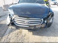 2014 Ford Taurus — photo 12 of 16 | VIN 1FAHP2E89EG100708