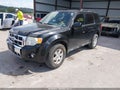 2011 Ford Escape — photo 2 of 12 | VIN 1FMCU0E76BKB39057