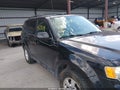 2011 Ford Escape — photo 6 of 12 | VIN 1FMCU0E76BKB39057